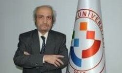 Üniversitenin lojmanında ölü bulundu