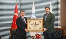 Başkan Genç'ten Uslu'ya ziyaret