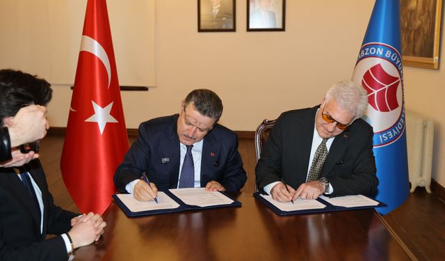 Ahmet Metin Genç ile Tamer Karadağlı arasında protokol imzalandı