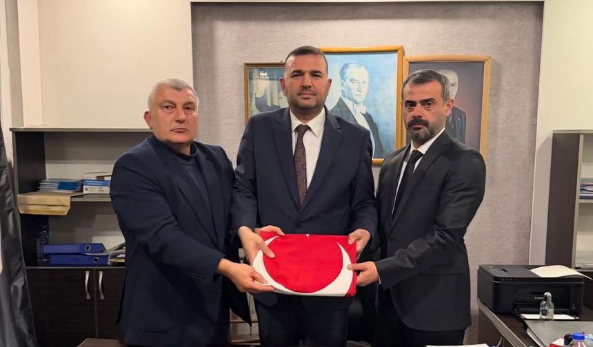 MHP Arsin İlçe Başkanlığı’nda Devir-Teslim töreni gerçekleştirildi